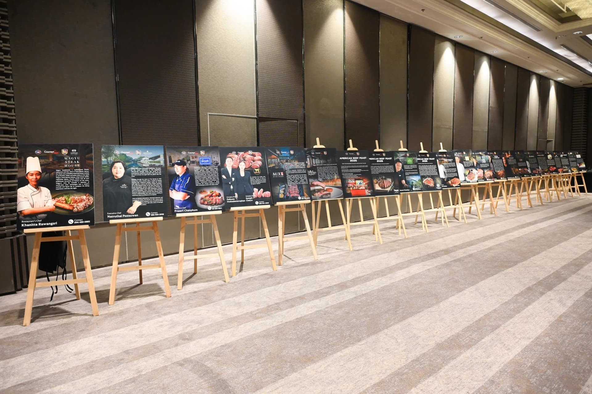 A row of campaign display boards showcasing participating restaurants and beef menus.