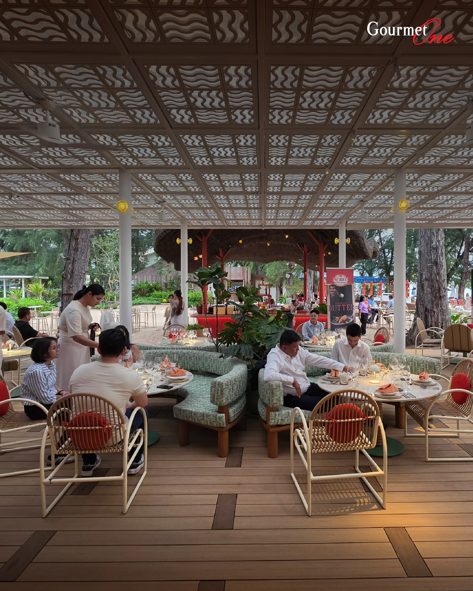Guests dining on the terrace at The Standard, Pattaya Na Jomtien.